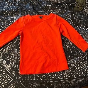 Ann Taylor red top with side zippers.